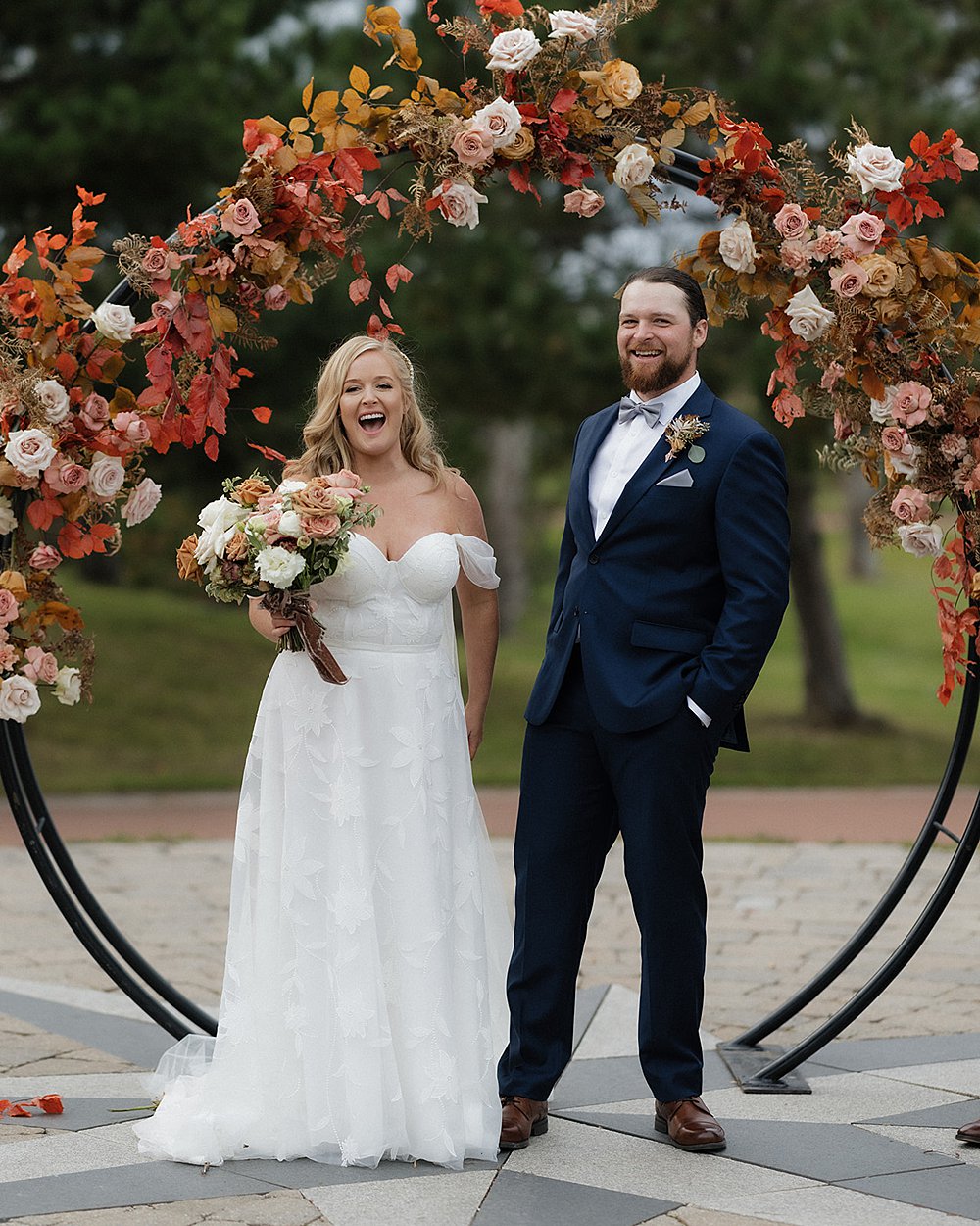 Bride and groom holding hands during ceremony at Fox Harb’r Resort Nova Scotia
