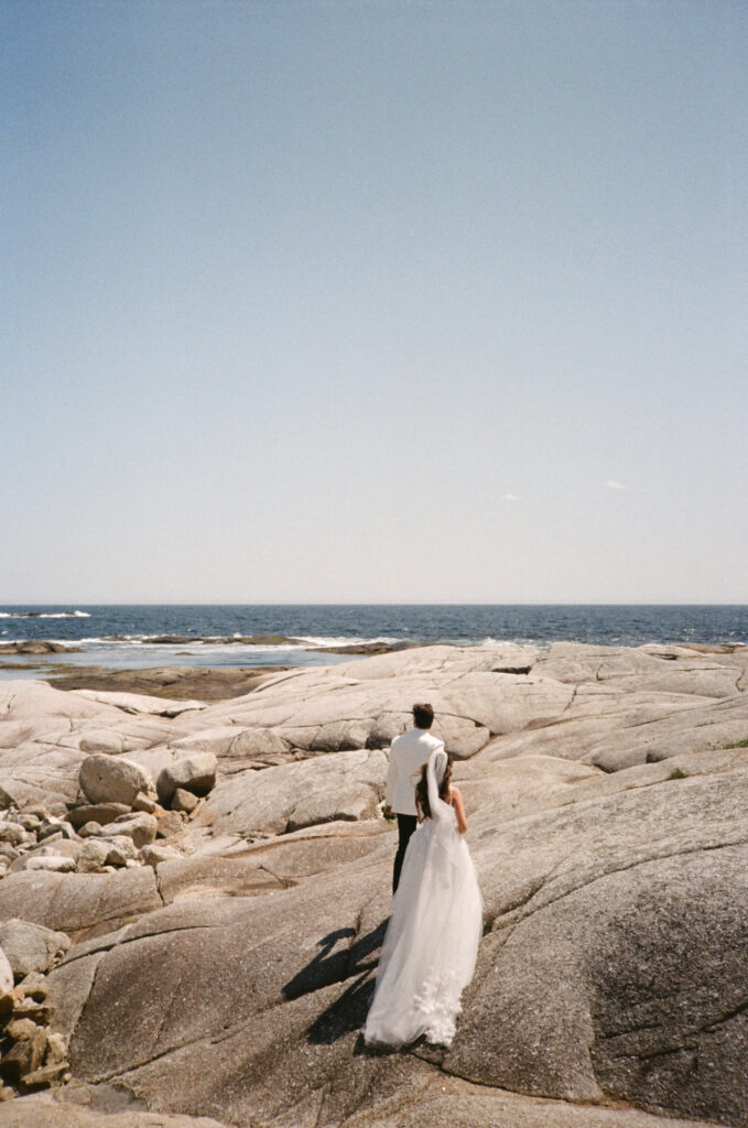 Wedding portraits at Peggy’s Cove lighthouse during Oceanstone Resort wedding