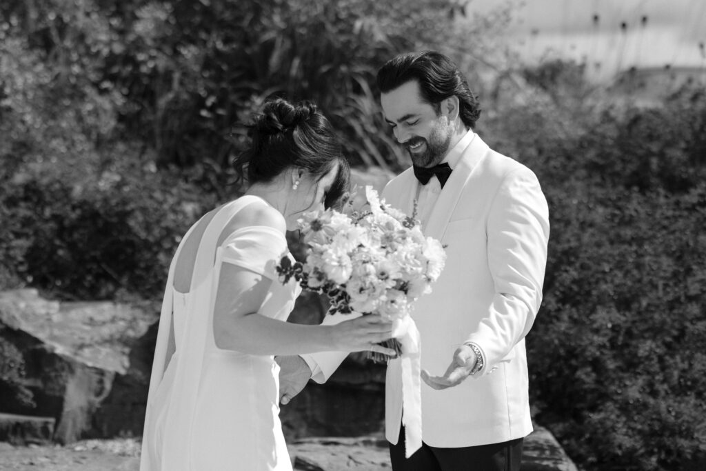 Bride and groom sharing a quiet moment together before their wedding ceremony in Nova Scotia