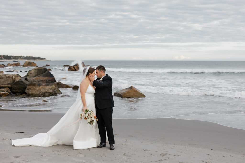 Bride and groom portraits on the beach at White Point Beach Resort