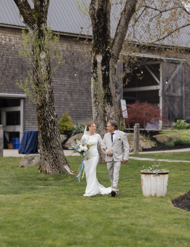 Bride and groom portraits along the rocky coastline at a Nova Scotia wedding venue
