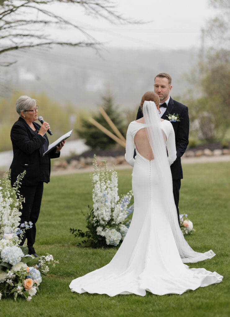 Bride and groom portraits along the rocky coastline at a Nova Scotia wedding venue