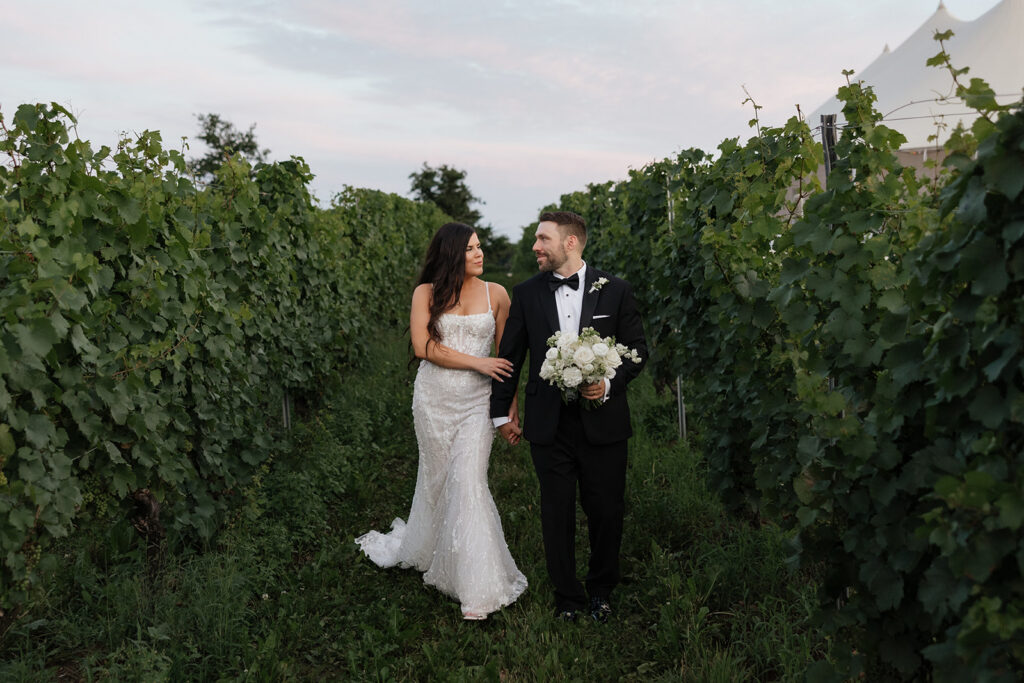 Bride and groom portraits in the vineyards at Lightfoot & Wolfville