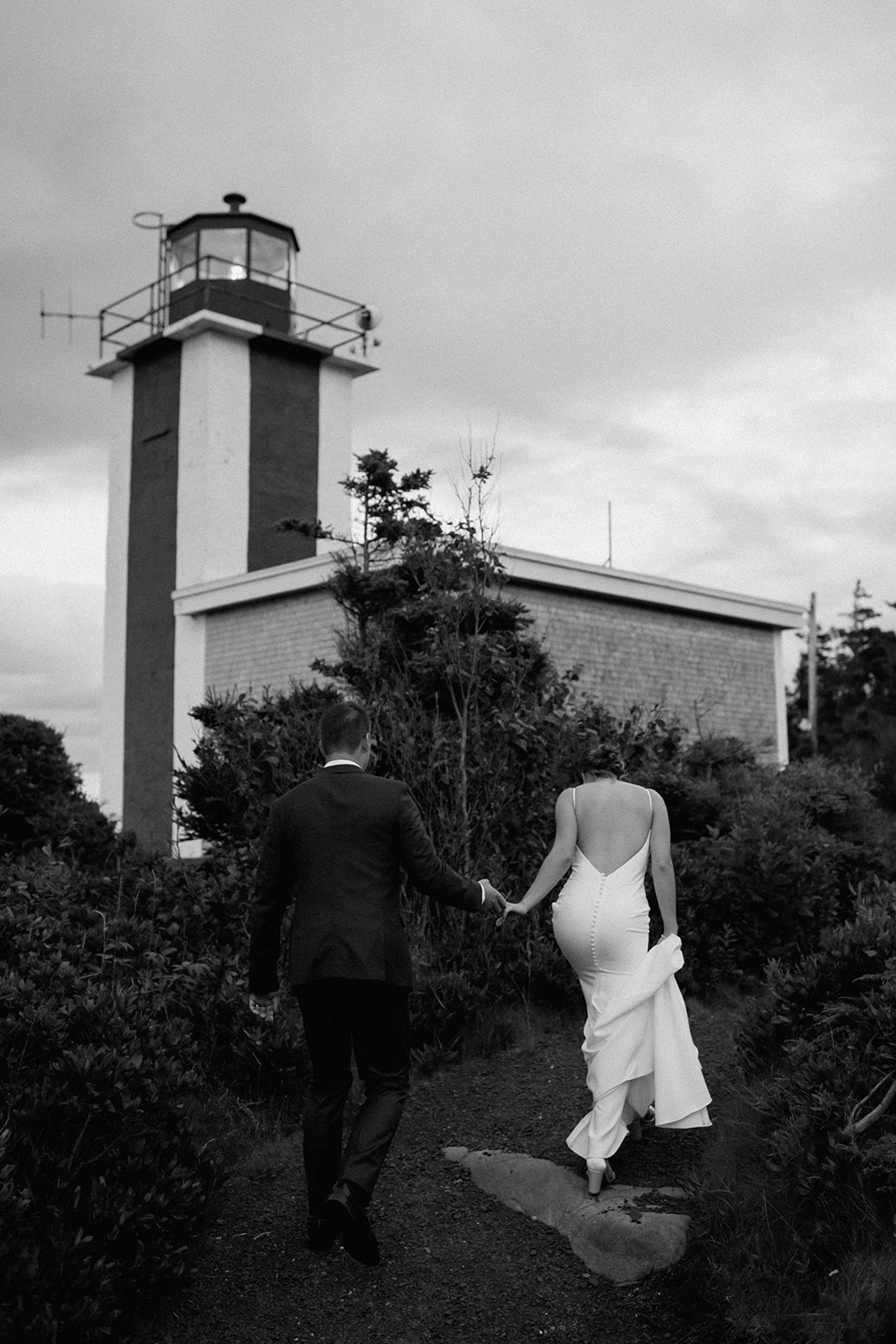 Couple embracing at sunset during a coastal Nova Scotia wedding