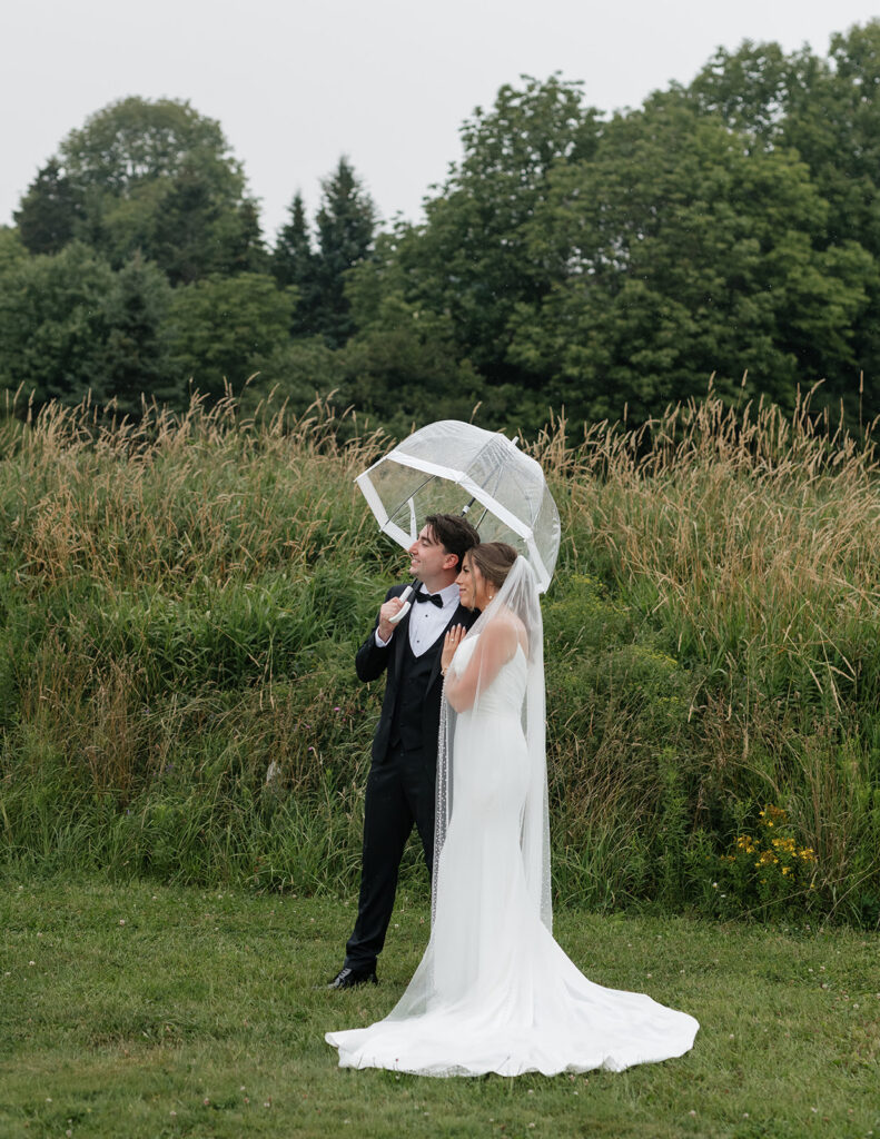 Bride and groom portraits overlooking the South Shore at Farm at South Cove