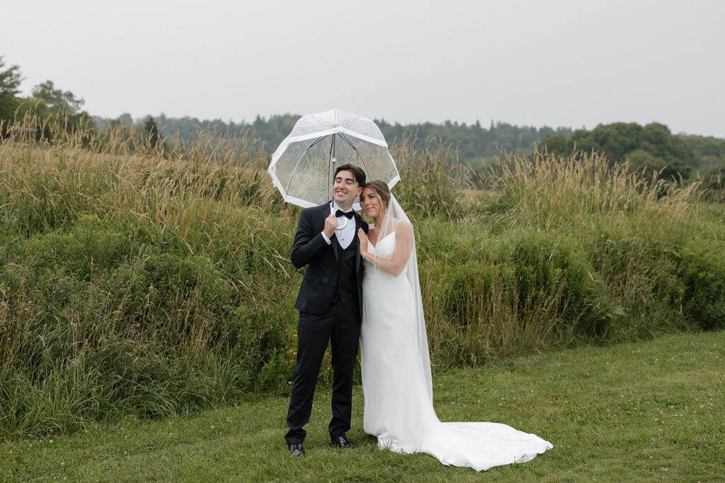 Bride and groom portraits overlooking the South Shore at Farm at South Cove
