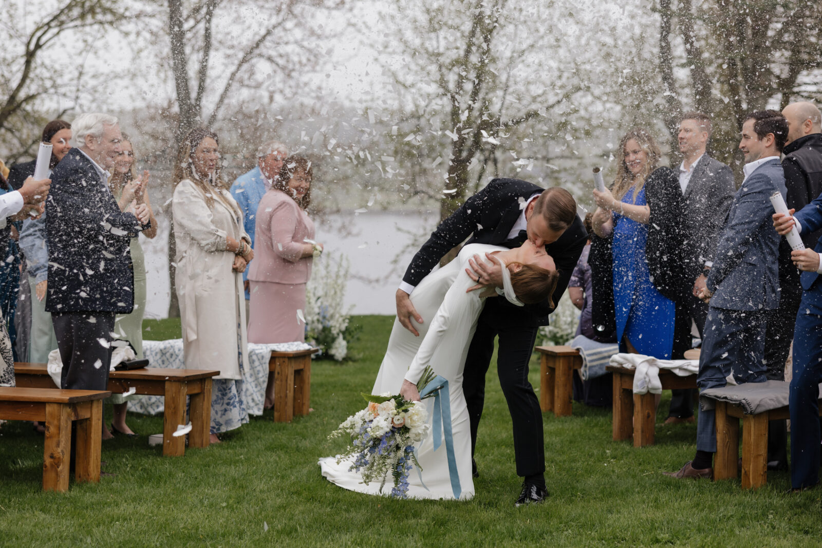 Bride and groom portraits along the rocky coastline at a Nova Scotia wedding venue