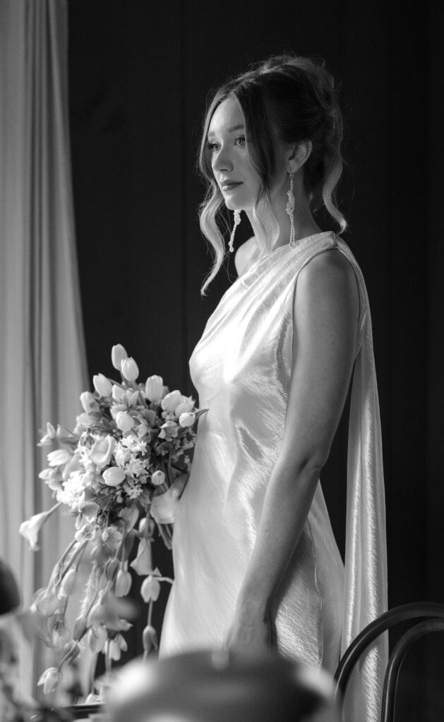 Romantic couple portrait in a restored farmhouse setting in Nova Scotia