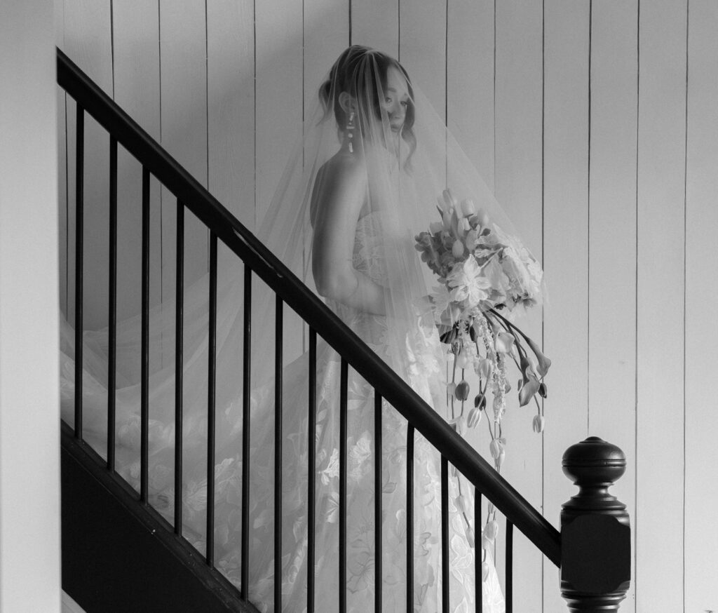 Wedding editorial scene inside a 1896 farmhouse in Grand Pré