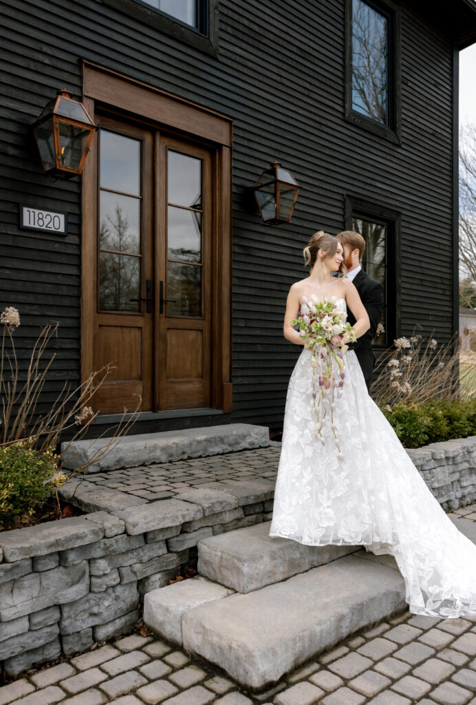 Romantic couple portrait in a restored farmhouse setting in Nova Scotia