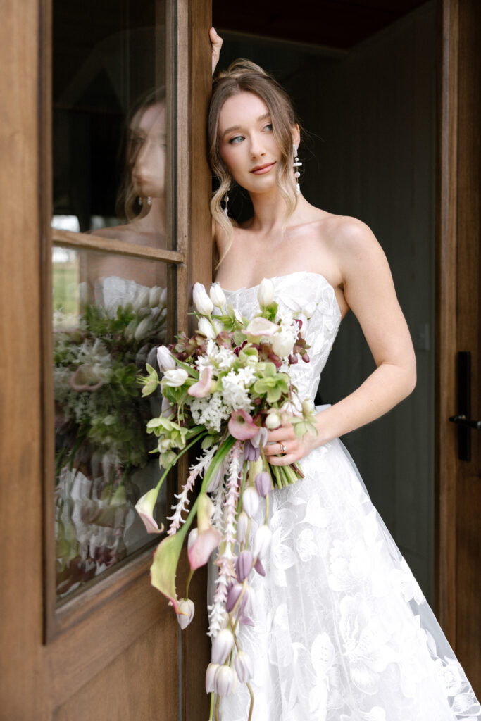 Romantic couple portrait in a restored farmhouse setting in Nova Scotia